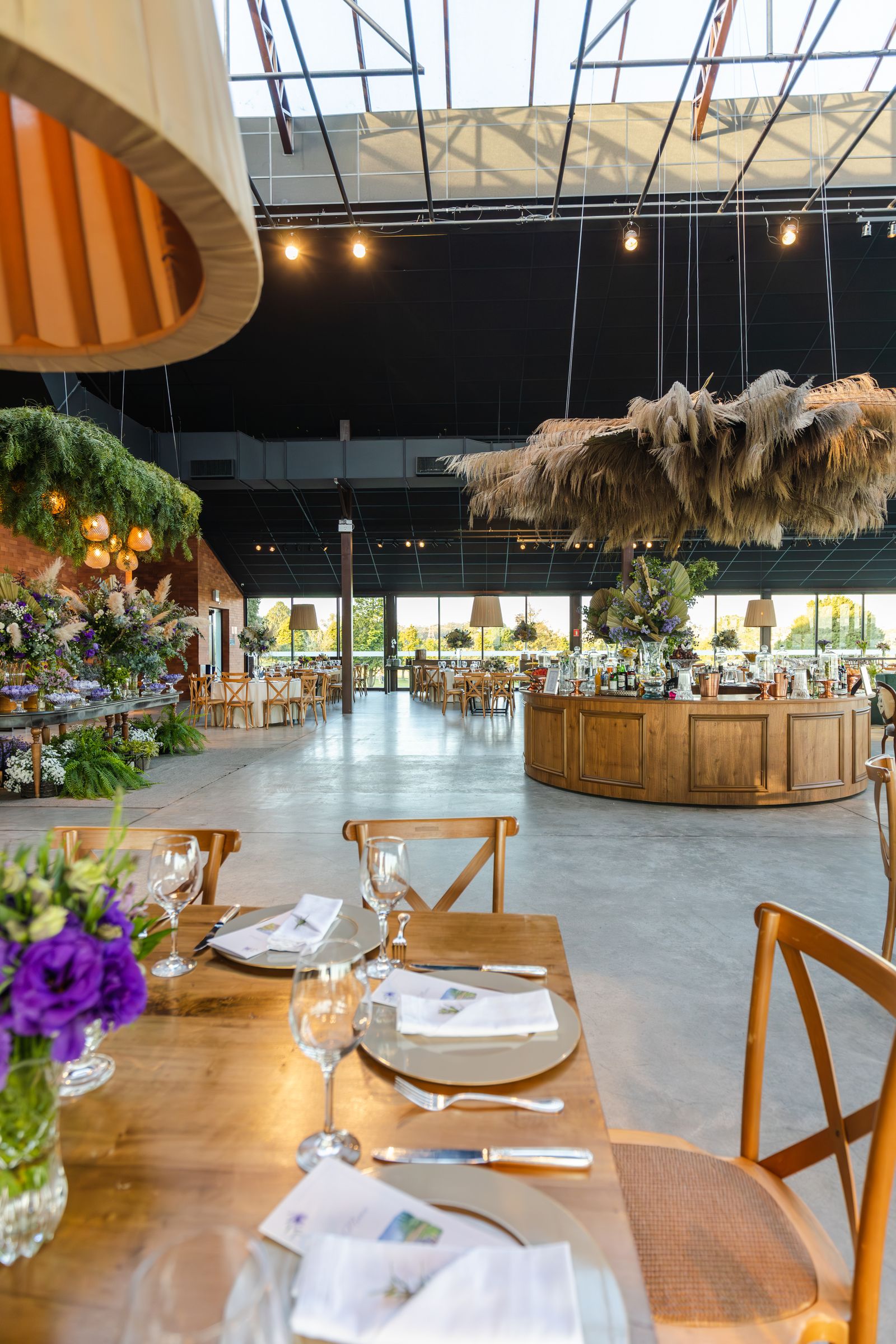 Hospitality event space prepared with service tables